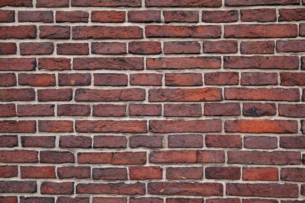 Red brick wall.